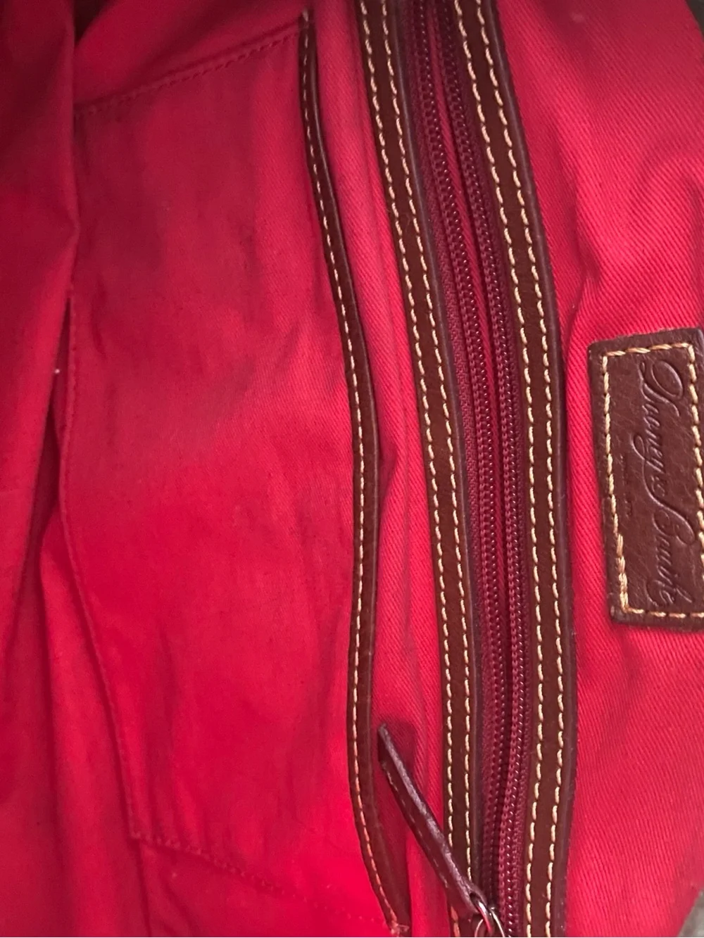 Dooney & Bourke Brown Leather Satchel with Gold Hardware and Tassel